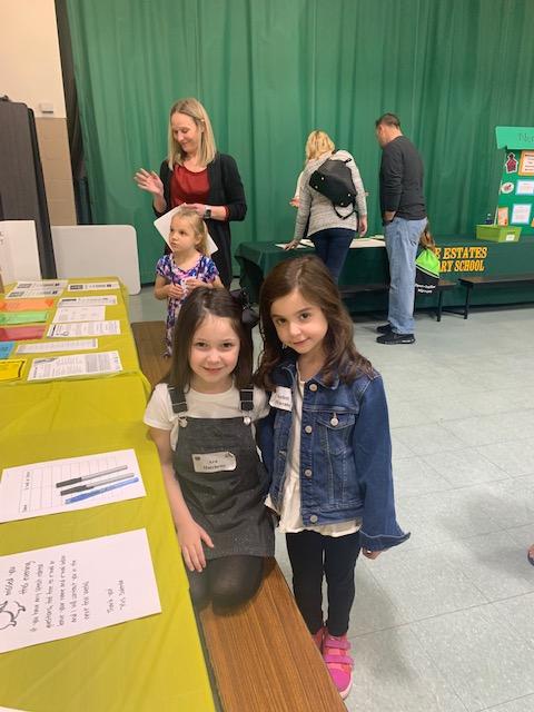 Future kindergarteners Ava Hutchens and Scarlett DiLucente attend the kindergarten kickoff at Sunrise Estates Elementary School