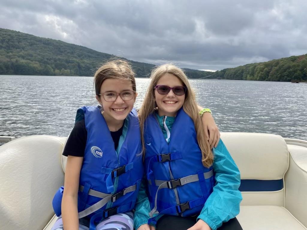 McCullough students Molly Kessler and Anna Haas enjoy a boat ride after fishing