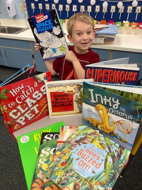 1st-grader Matthew Smith received 10 new books to keep