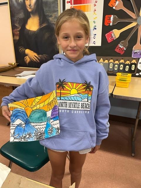 Sunrise Elementary 4th-grader Caroline Jenesky created a seascape to resemble her shirt design