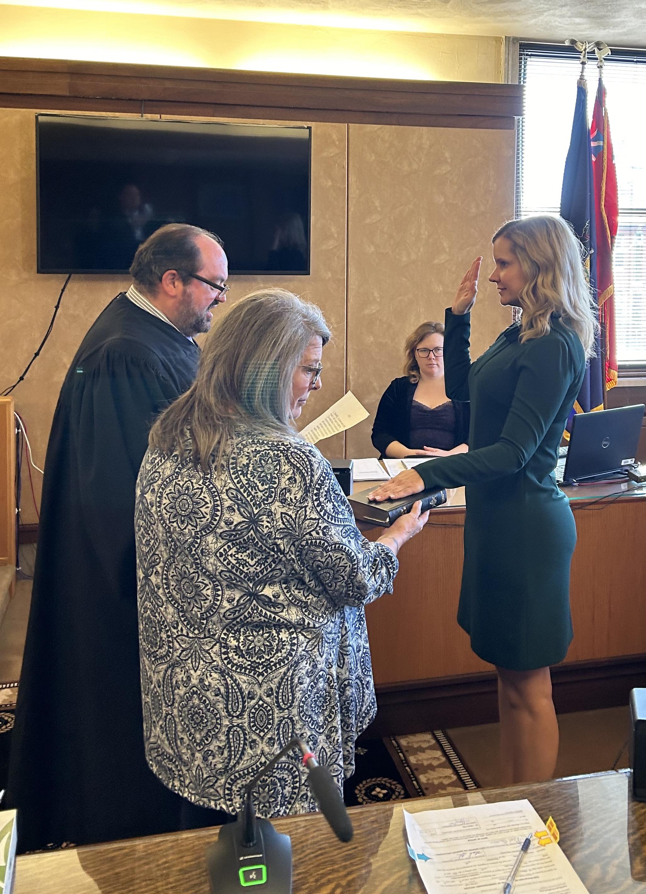 Dr. Tiffany Nix (right) received the oath of office from Judge Harry F. Smail, Jr.